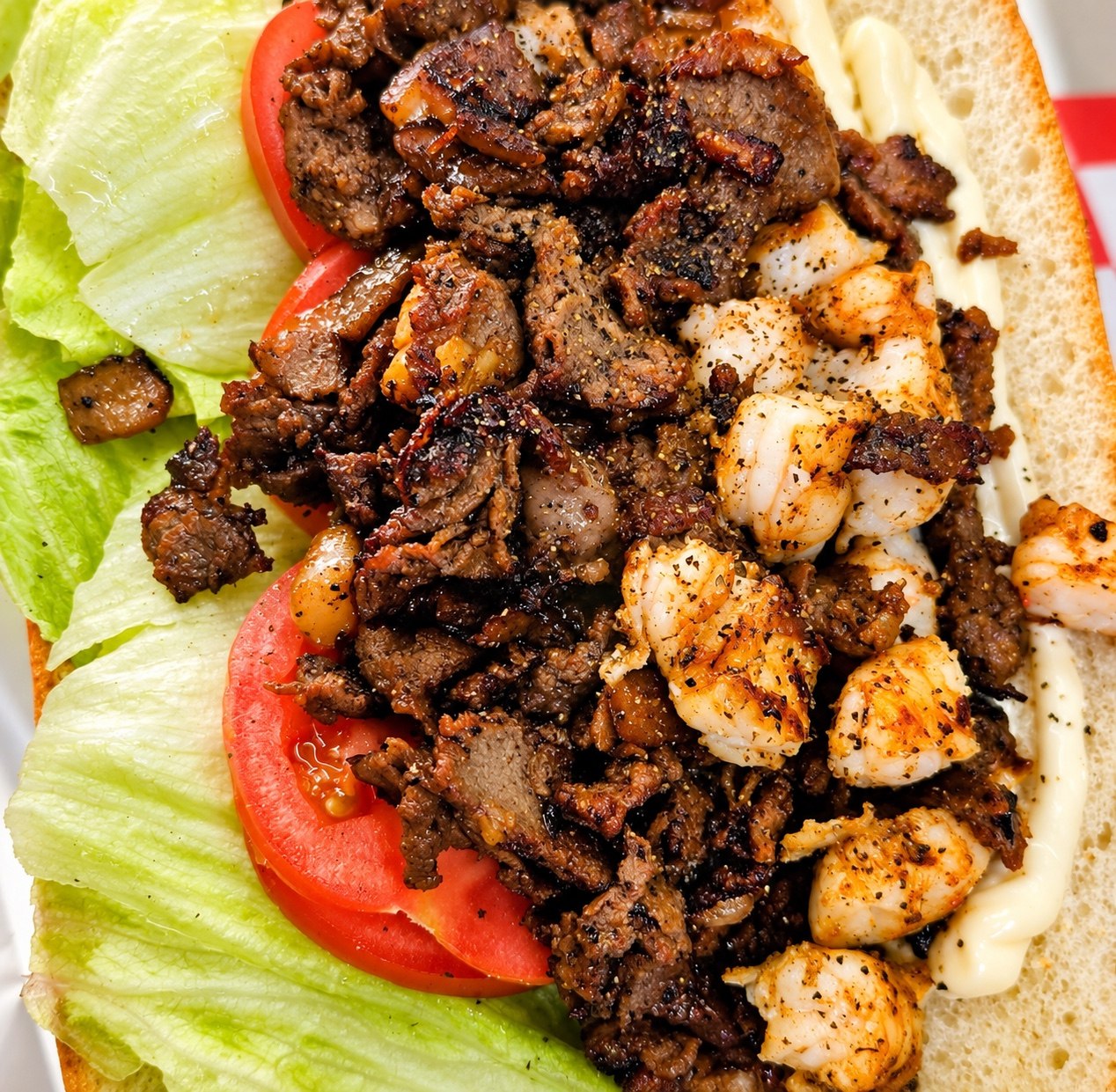 Steak and shrimp sandwich